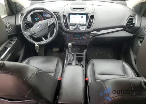 2017 Ford Escape Titanium z USA, uszkodzony, nr VIN 1FMCU0JD3HUD63217